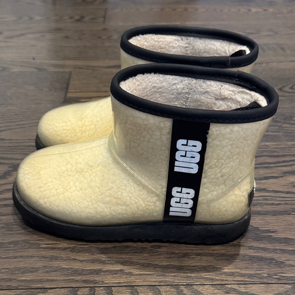 UGG Cream Shearling Boots with Black Trim